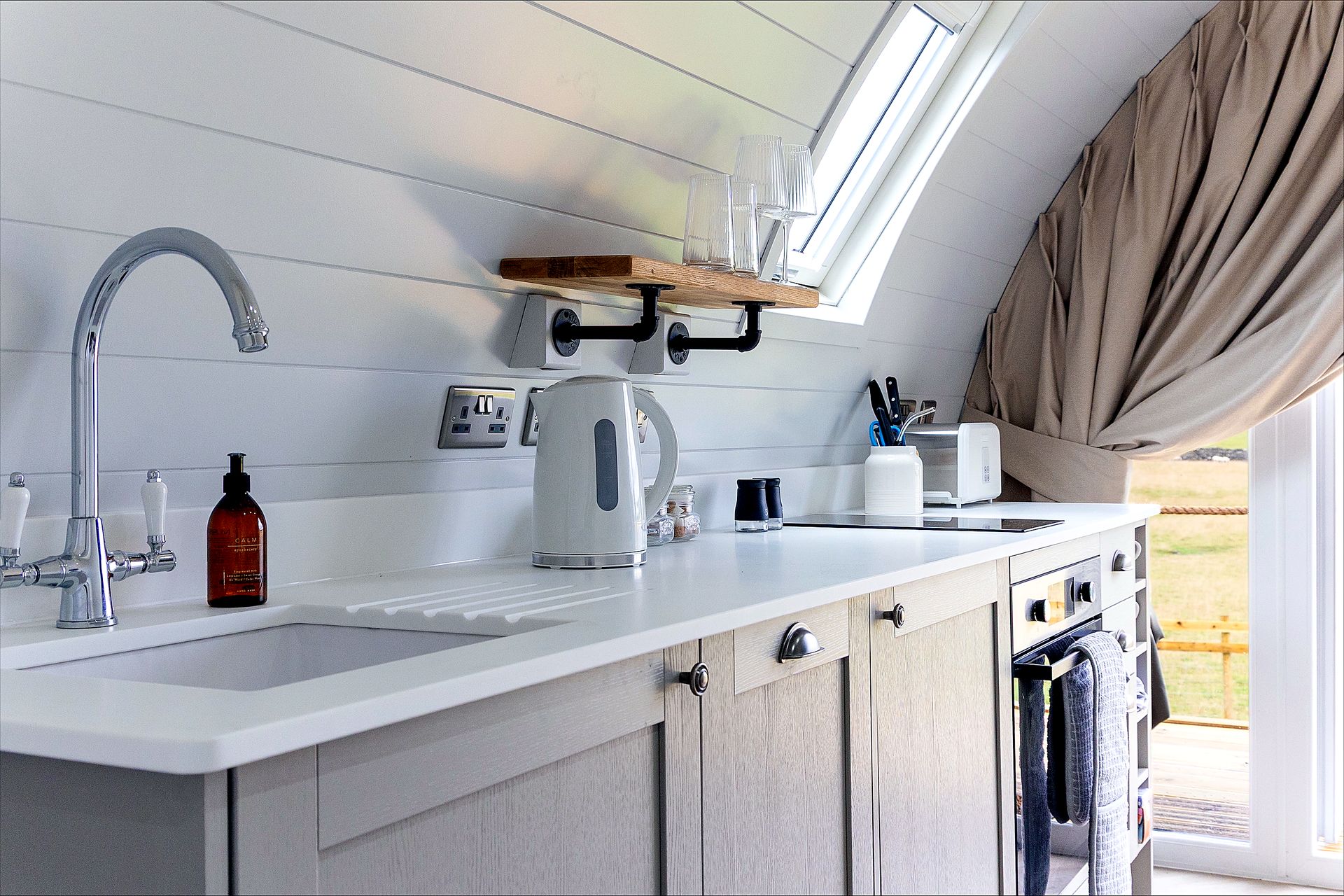 Pod kitchenette overlooking the fields