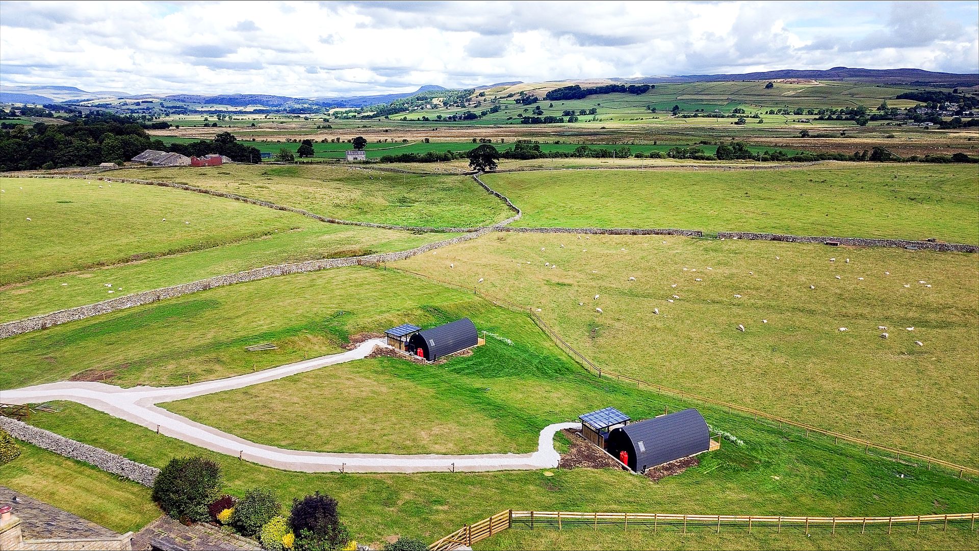 Aerial view of the Longview glamping pods on the working farm at Wigglesworth