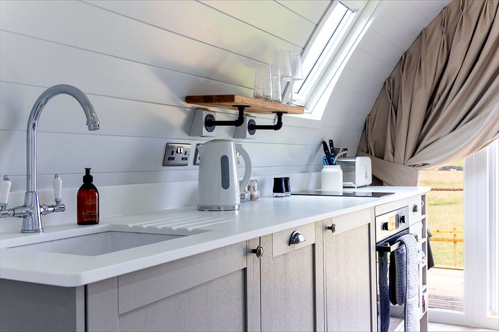 Pod kitchenette overlooking the fields