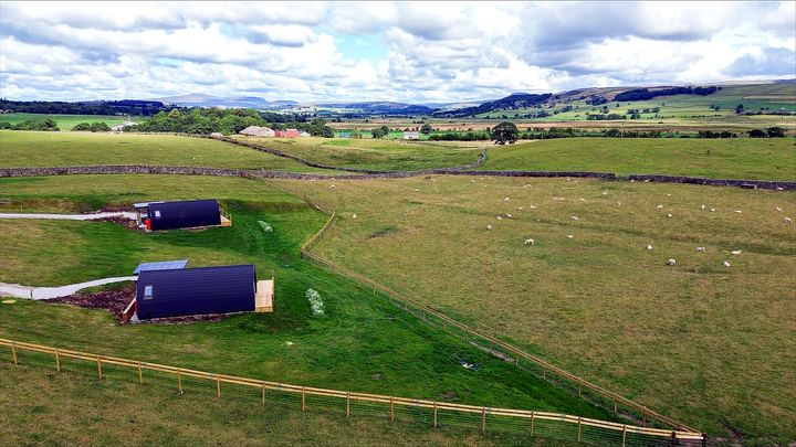 Aerial view of both pods in the Dales landscape